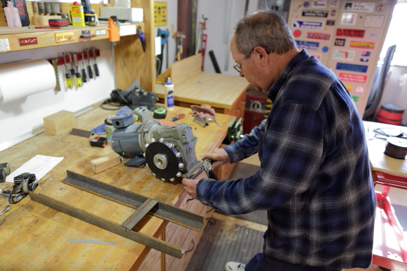 Tom works on motor mounting bracket