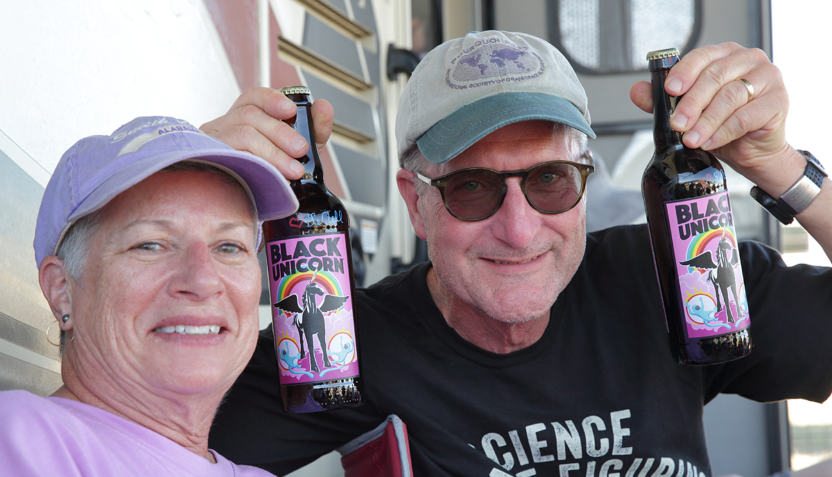 John and Cindy with a unicorn beer