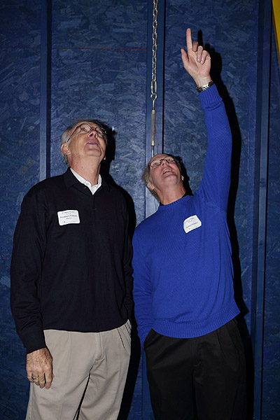 Bob points out features of the 50" to EIU president Bill Perry